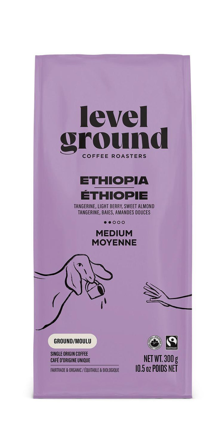 A bag of Level Ground Coffee Ethiopia with a purple and pink color scheme, featuring an illustration of a coffee plant and beans.