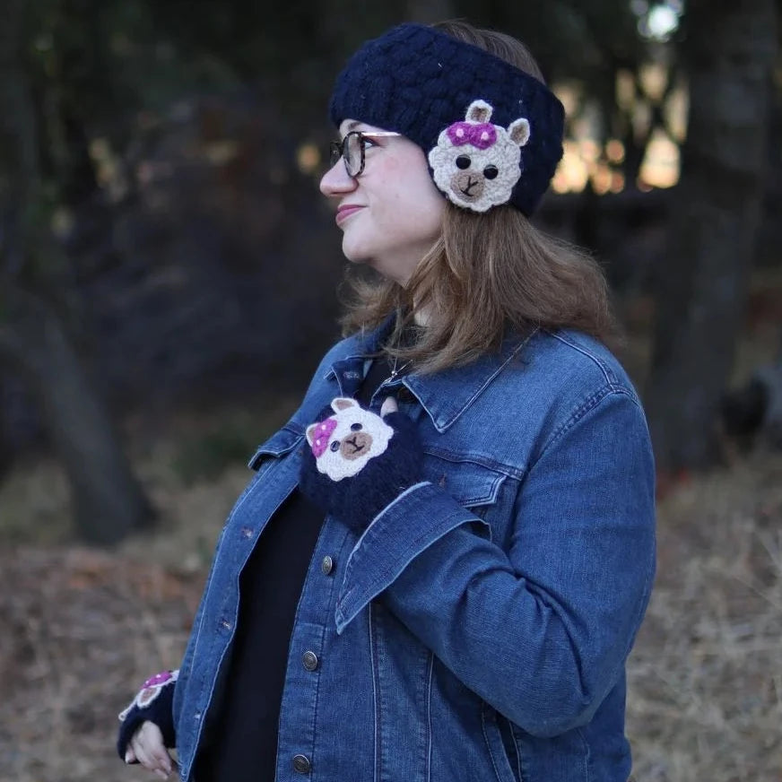 woman wearing a blue alpaca ear warmer and arm warmer