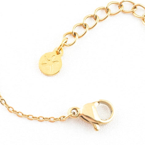 Gold chain bracelet with a clasp on a white background