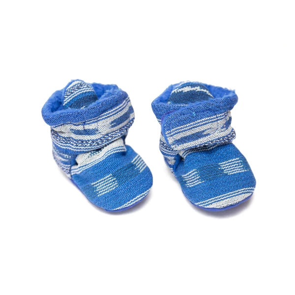 Pair of blue baby socks with white stripes on a white background