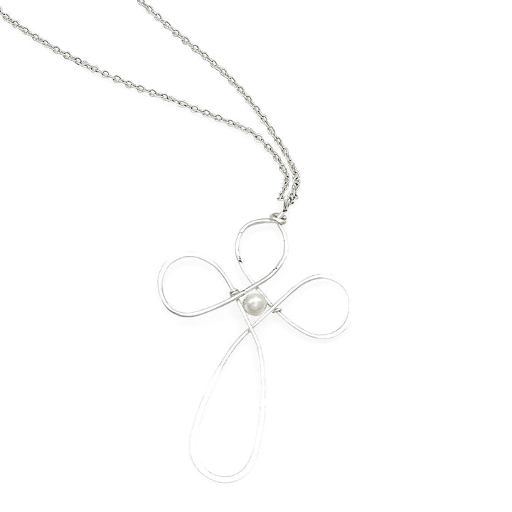 Silver necklace with a cross pendant featuring a pearl on a white background