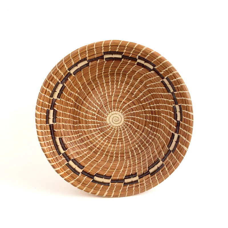 pine needle basket on a white background