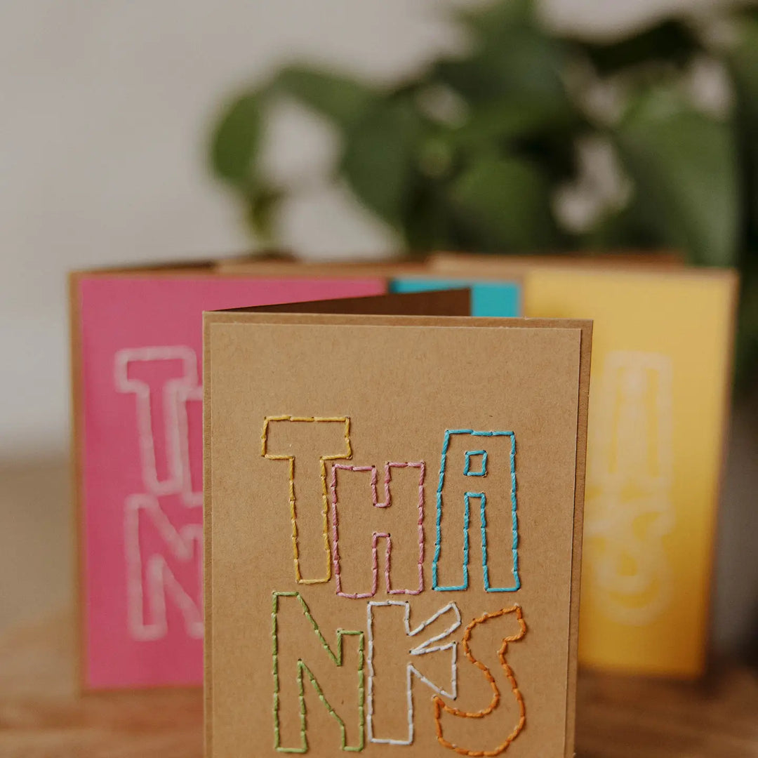 Card with 'THANKS' embroidered in colorful letters
