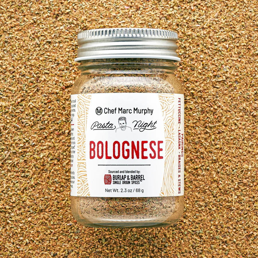 Jar of Bolognese spice mix with a label on a textured brown background