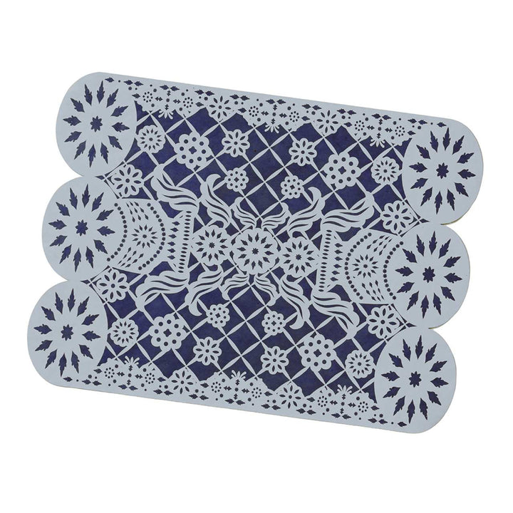 Blue decorative placemat with lace design on a white background