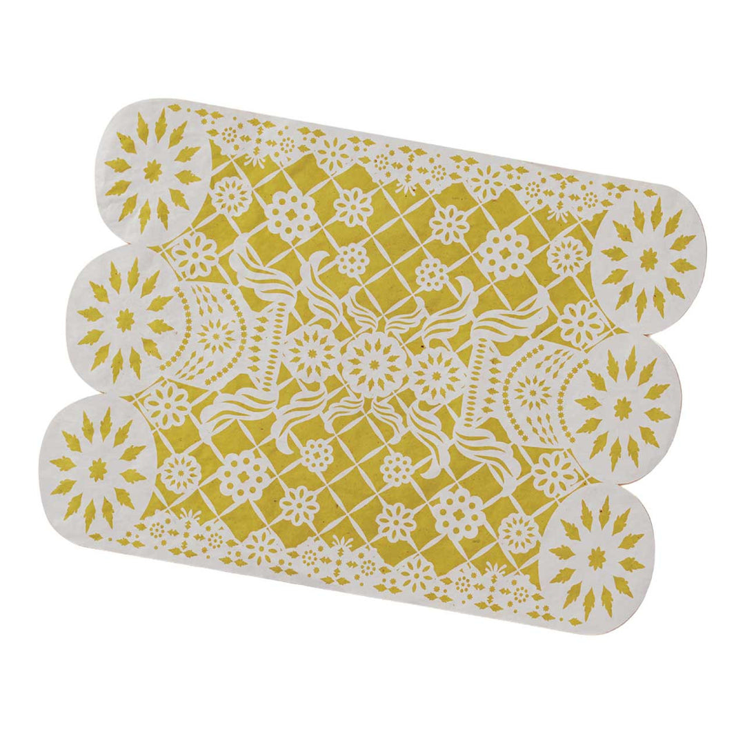  yellow and white patterned placemat on a white background