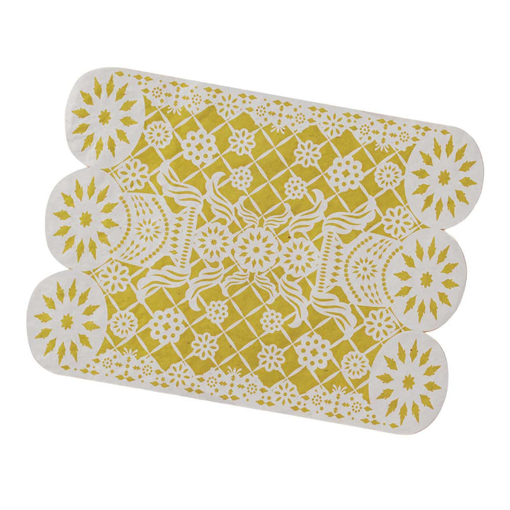  yellow and white patterned placemat on a white background
