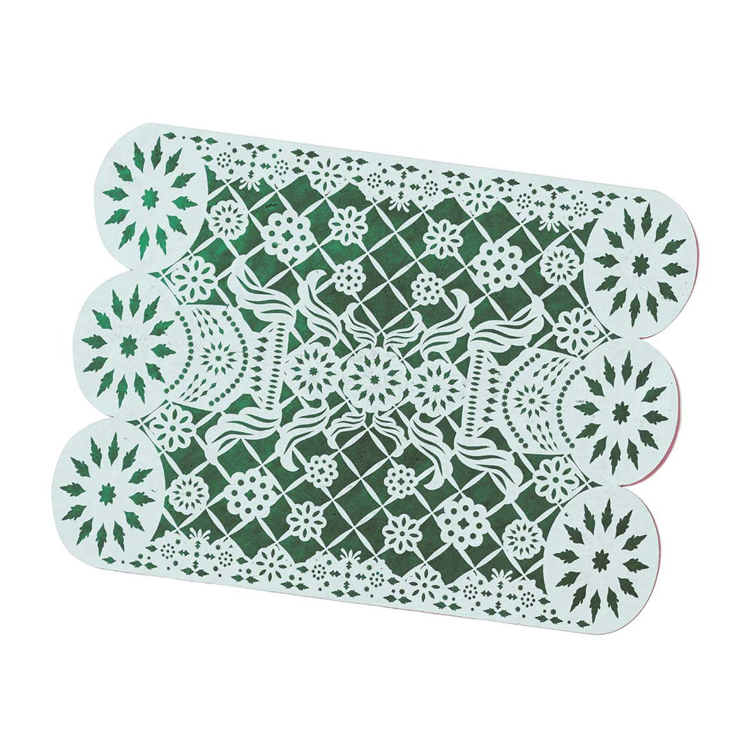 Green and white decorative placemat with floral and geometric patterns on a white background
