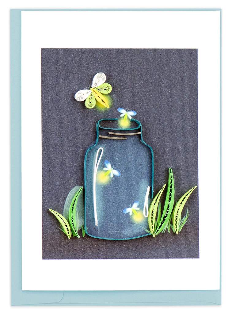 A rectangular greeting card featuring a quilled art design of a blue glass jar with glowing fireflies and green leaves, set against a dark charcoal background. The card has a wide white border and is shown with a light blue envelope behind it.