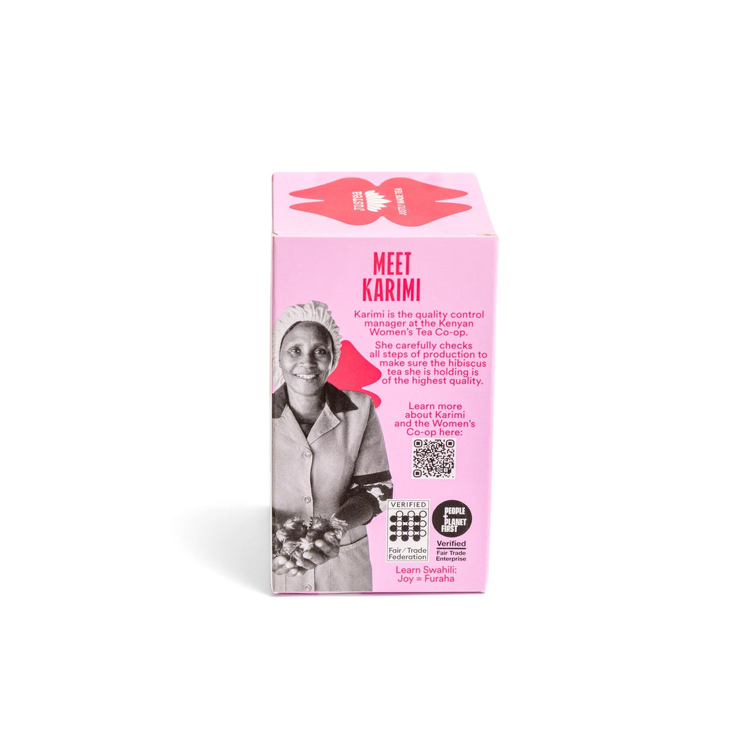 Justea Women's Co-op Lemon Ginger herbal tea packaging on a white background