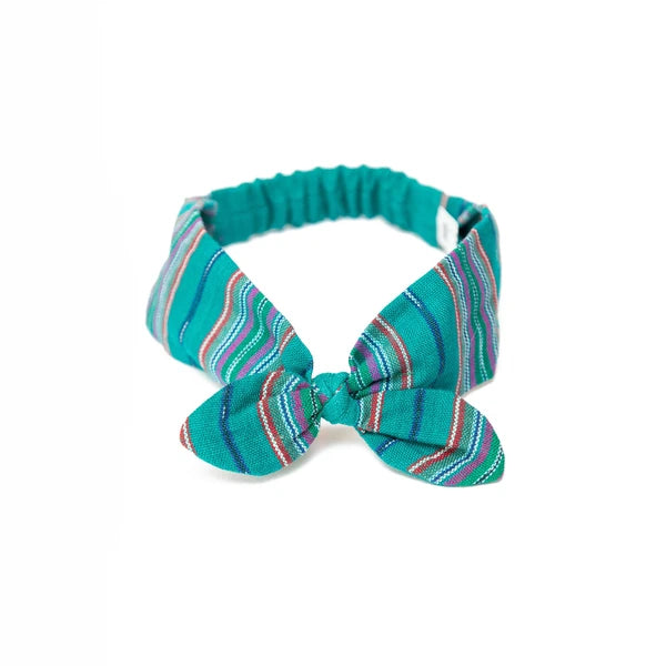 Teal striped headband with a bow on a white background
