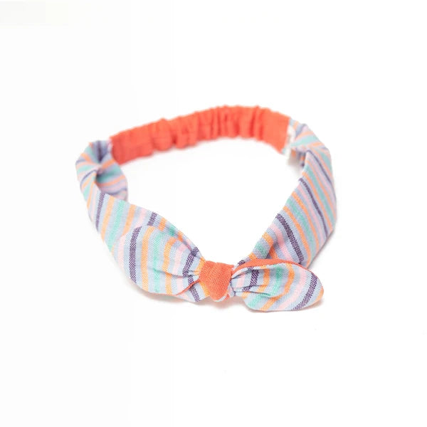 Colorful striped headband with a bow on a white background