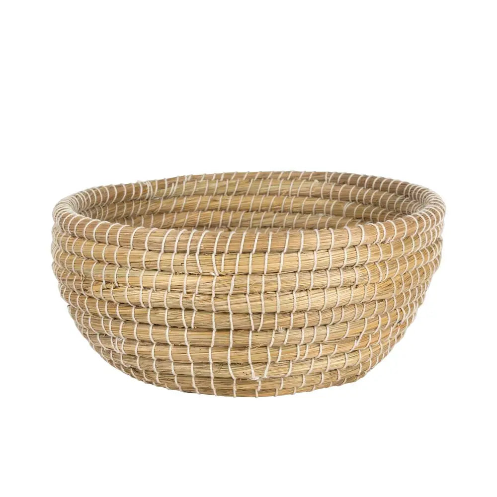 Woven basket made of natural materials on a white background