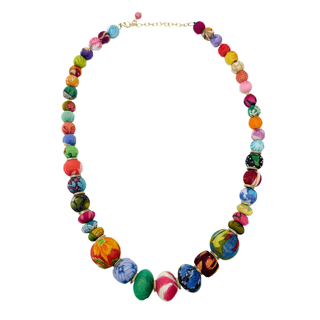 Colorful beaded kantha coterie necklace on a white background