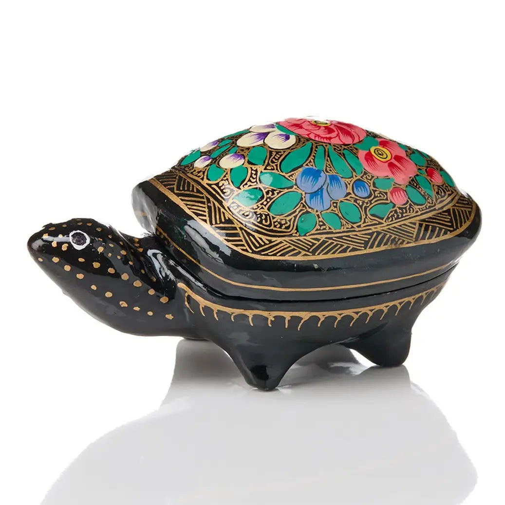 a kashmiri turtle box on a white background