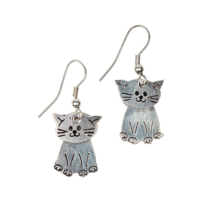 Cat-shaped earrings on a white background
