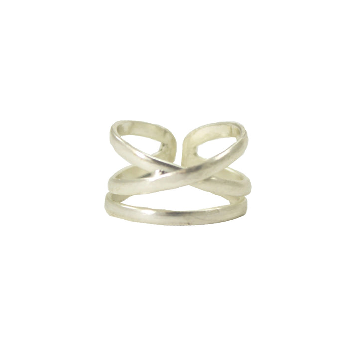 Silver ring with a twisted linear design on a white background