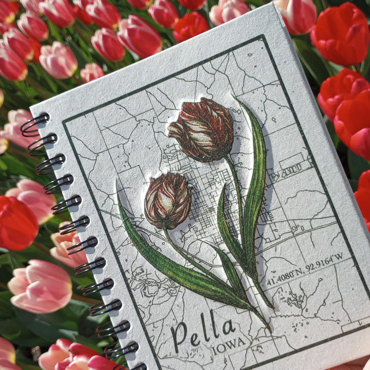a journal with tulips and a Pella, Iowa map