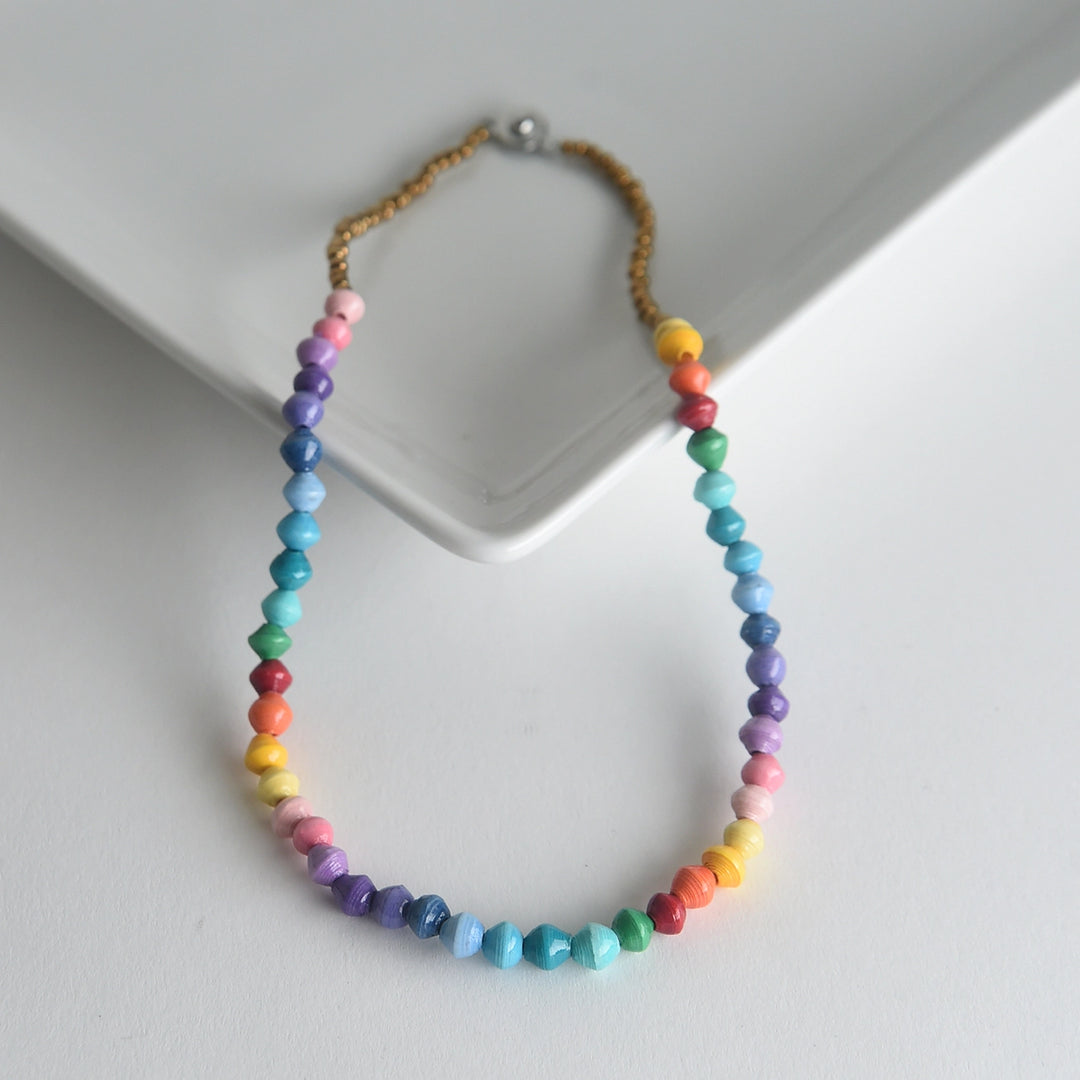 Colorful beaded necklace on a white background