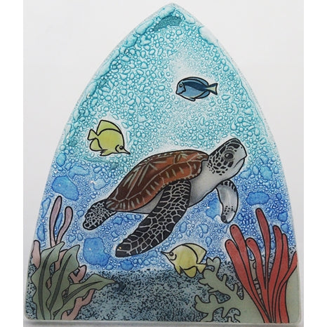 A nightlight featuring a sea turtle with coral and fish. 