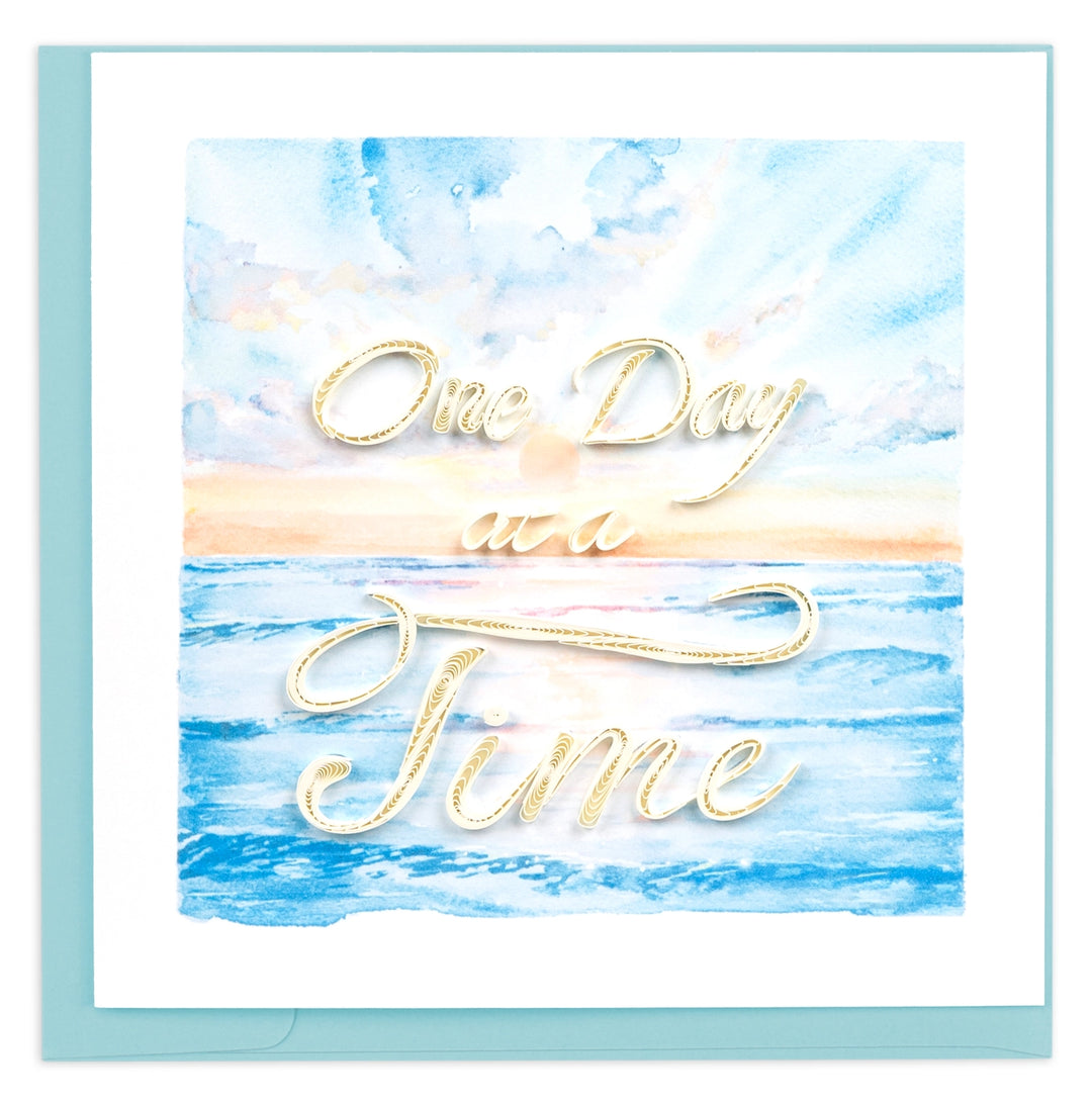 Quilling card with 'One Day at a Time' text on a watercolor background