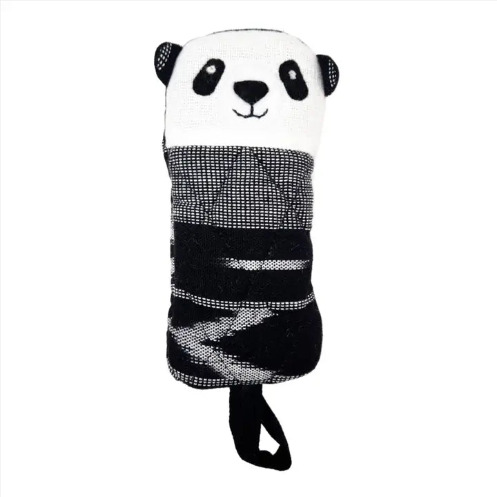 Panda shaped skillet holder with a black and white pattern on a white background