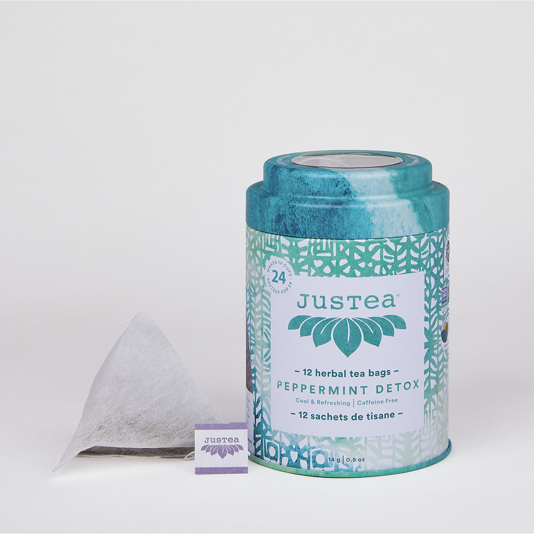 JusTea Peppermint Detox tea bag canister on a white background.