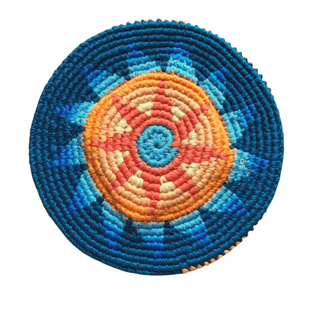 Round flying disk with concentric color pattern on a white background