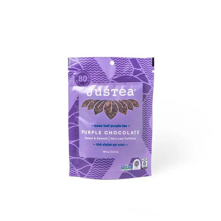 Purple package of JusTea purple chocolate tea on a white background
