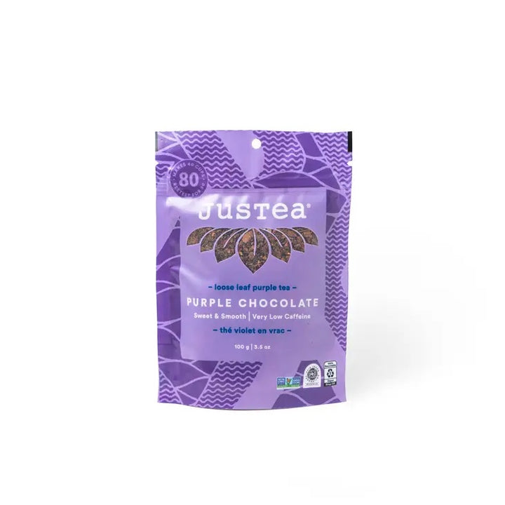 Purple package of JusTea purple chocolate tea on a white background