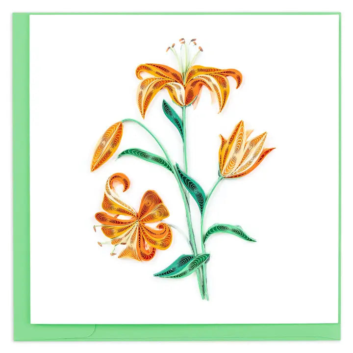 Quilled orange lilies with green leaves on a white background