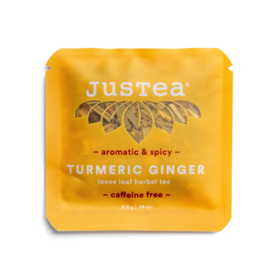 Justea Turmeric Ginger tea sample package on a white background