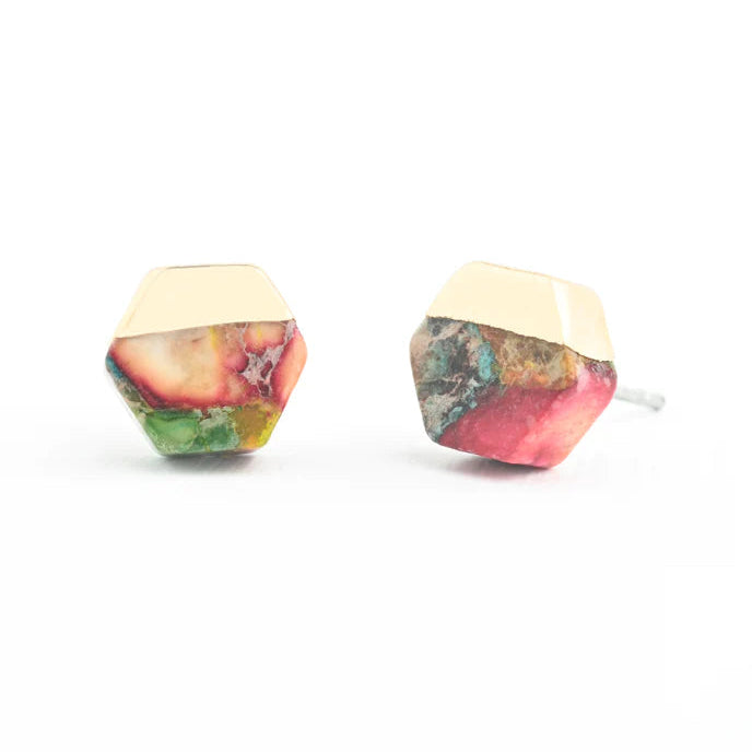 Dodecahedron-shaped earrings with multicolored stone and gold top on a white background