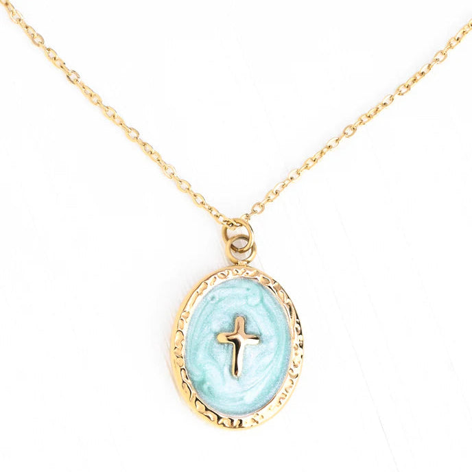 Necklace with a light blue pendant featuring a cross on a white background