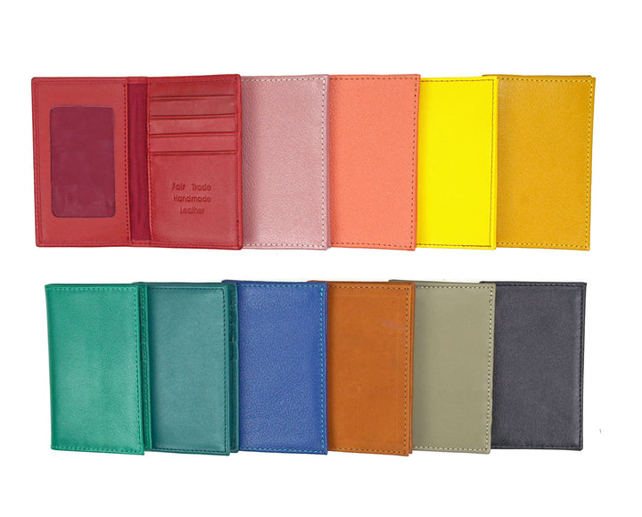Collection of colorful leather wallets arranged in a row on a white background.