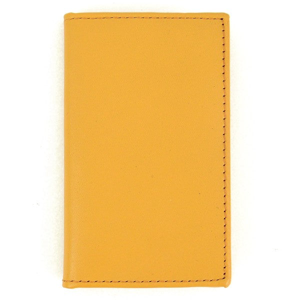 Yellow leather wallet on a white background