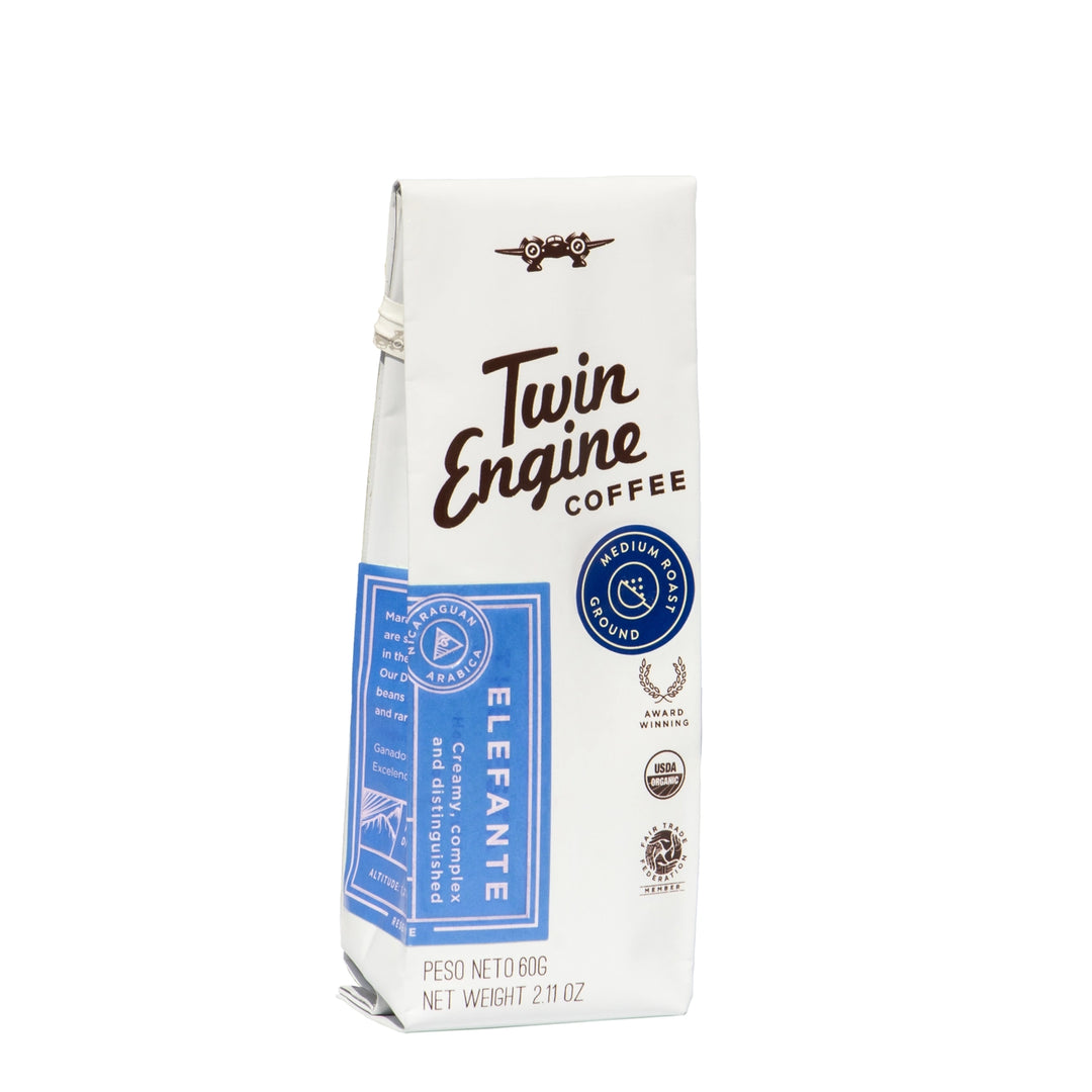 A 600g bag of Twin Engine Coffee's Elephant Blend medium roast whole bean coffee, shown on a clean white background.