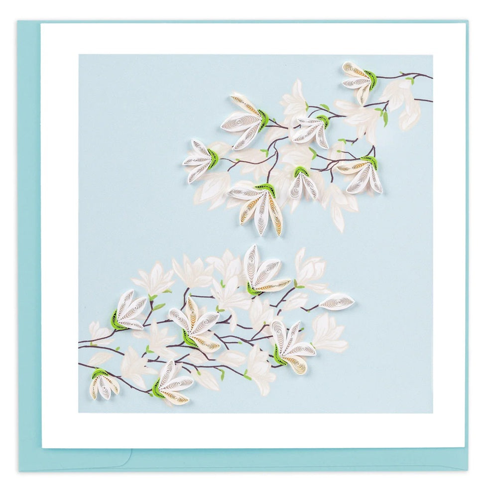 Card with white floral design on a light blue background