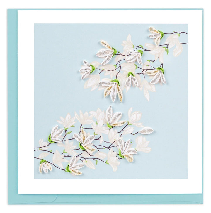 Card with white floral design on a light blue background