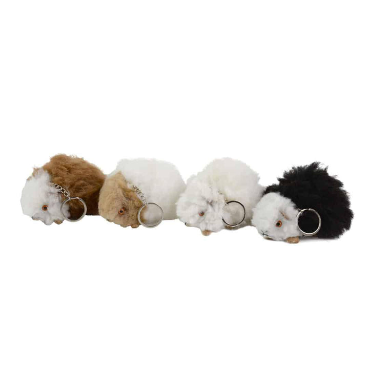 a group of alpaca guinea pig keychains