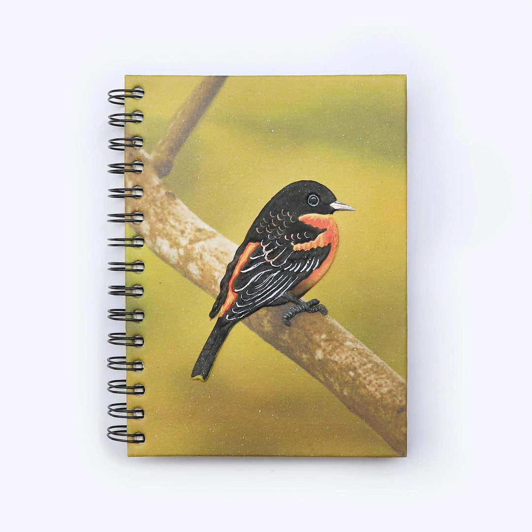 A mr. Ellie pooh notebook with a baltimore oriole 