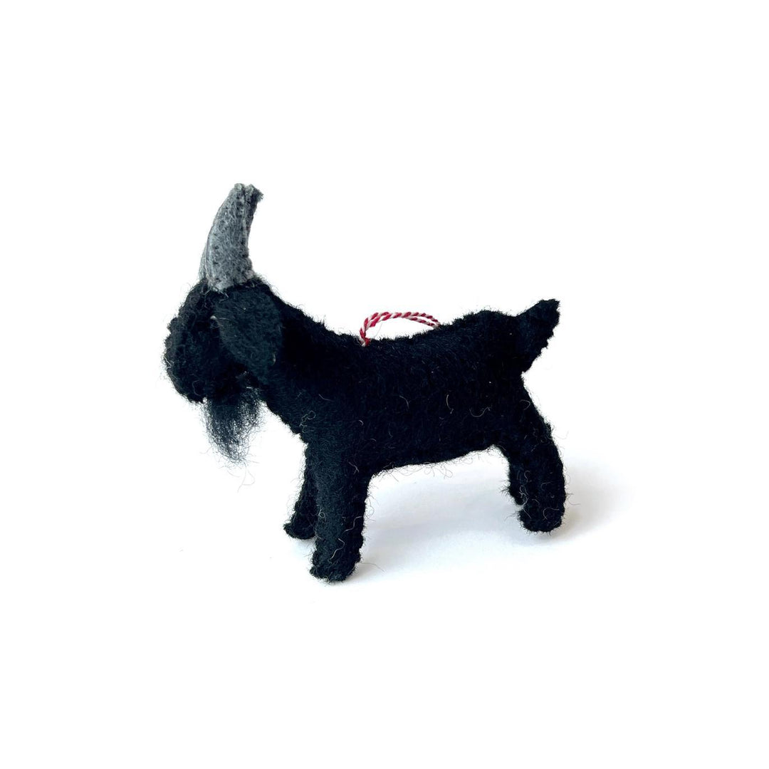 Black goat felted ornament with gray horns on a white background