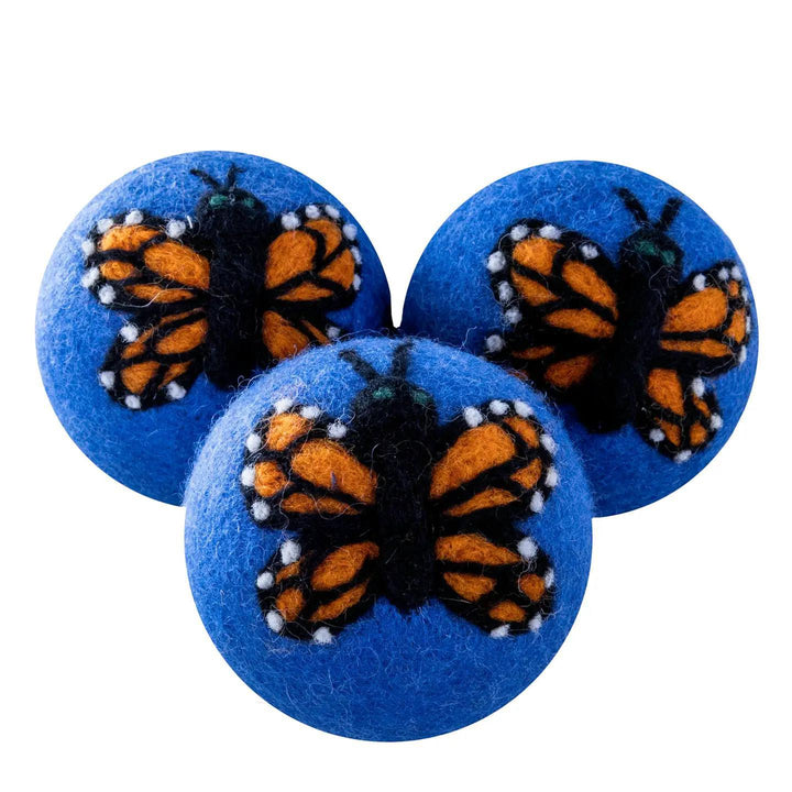 monarch blue dryer balls on a white background