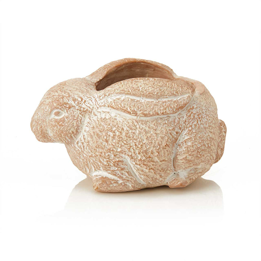 Terracotta rabbit-shaped planter with a textured surface on a white background