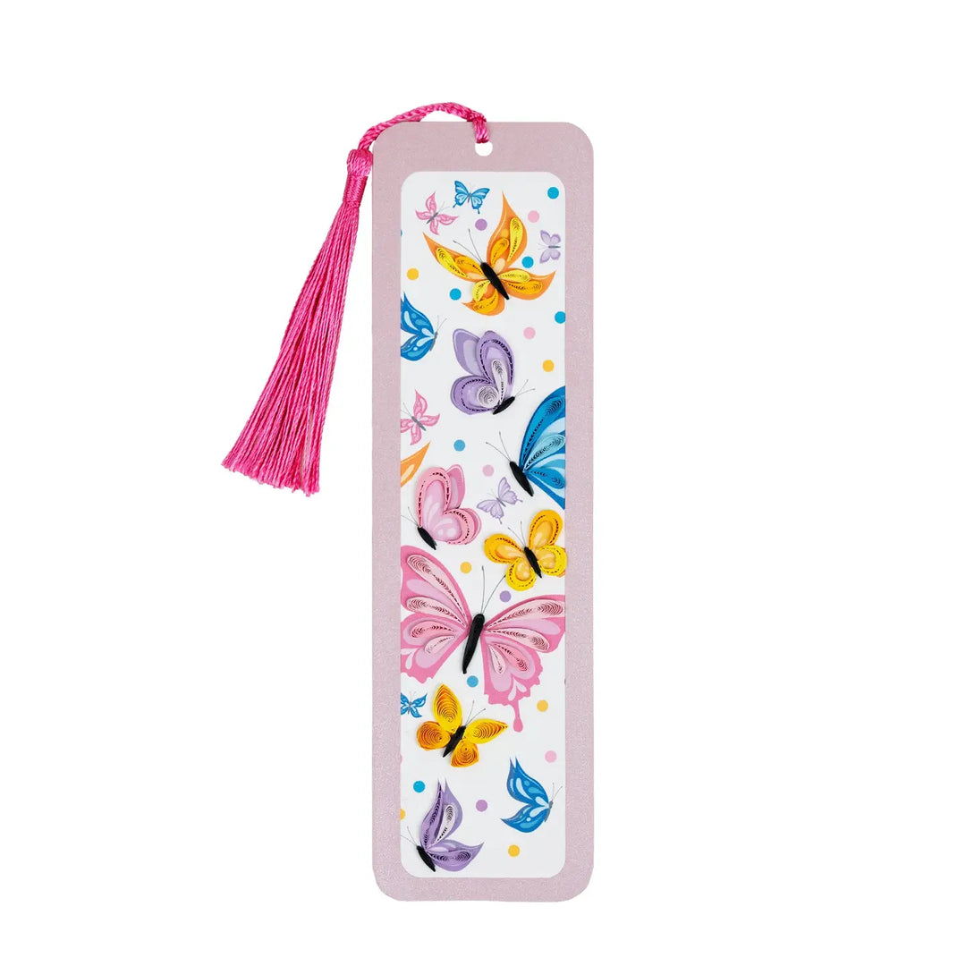 Bookmark with colorful butterfly design and pink tassel on a white background