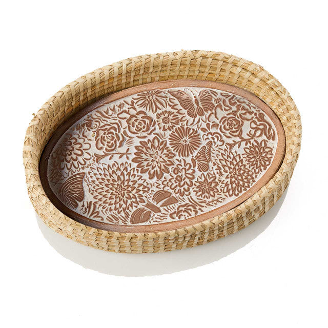 Decorative breadwarmer with floral patterns on a white background