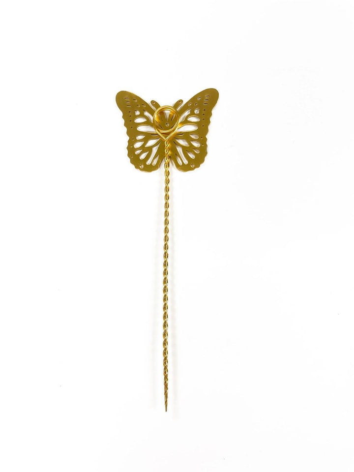 Gold butterfly plant stake on a white background