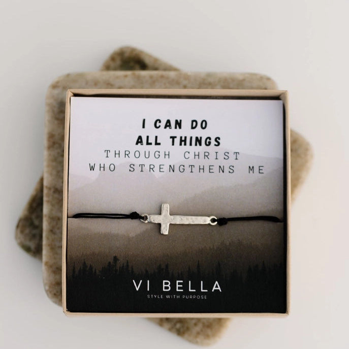 Bracelet with cross design on a VI BELLA branded card with motivational quote