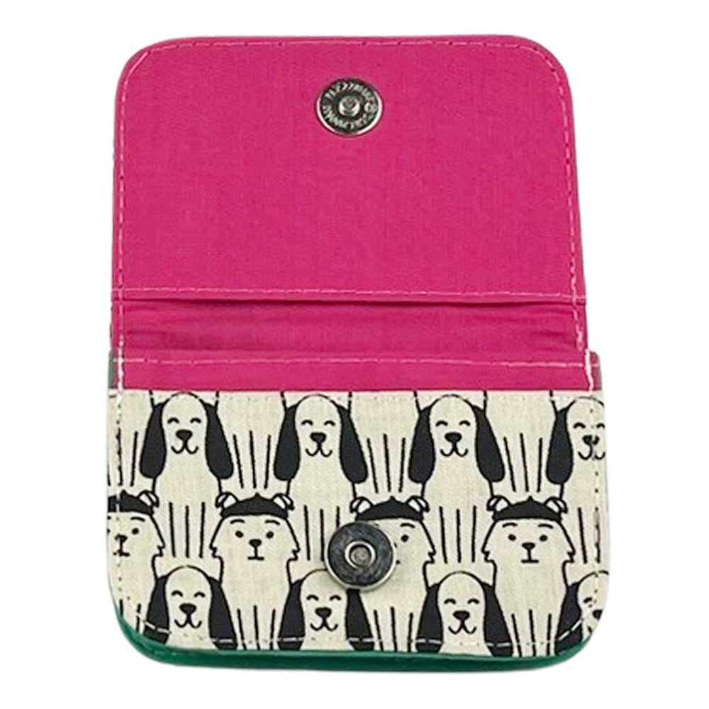 Pink wallet with dog pattern on a white background