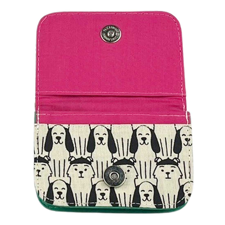 Pink wallet with dog pattern on a white background
